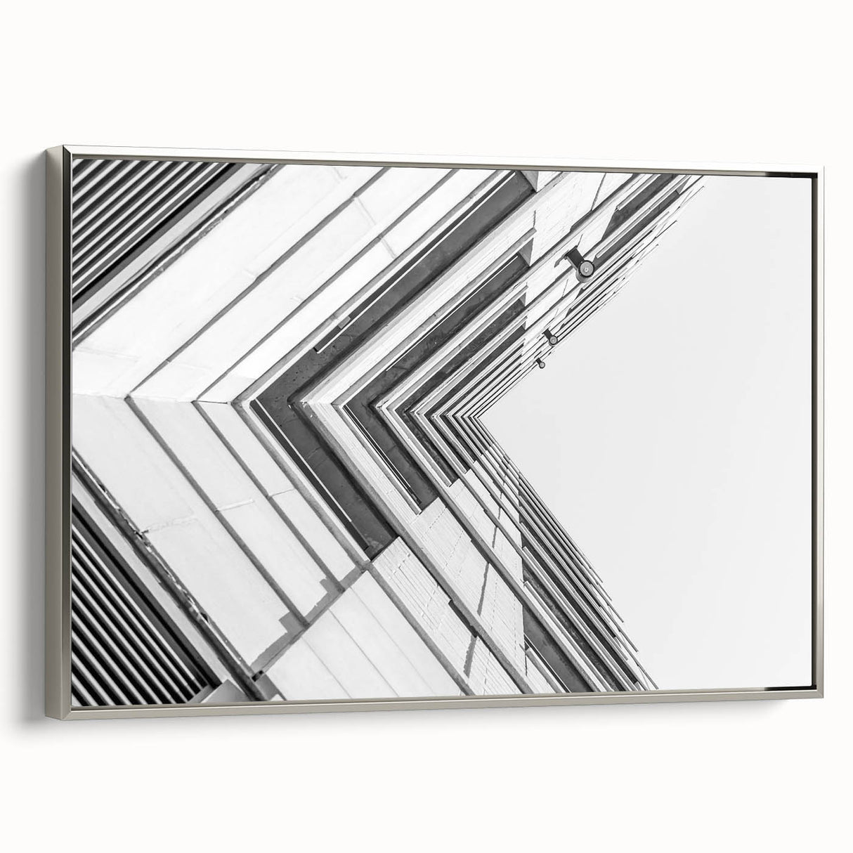 Vintage poster art of a vibrant cityscape on a large framed canvas, featuring a mix of bright colors.