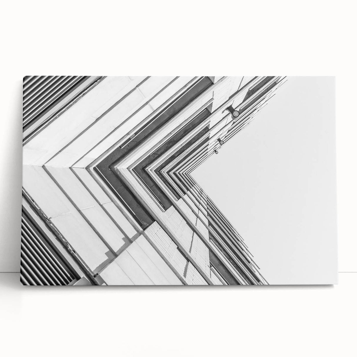 Black and white abstract design on a large stretched canvas, ideal for kitchen wall art or bedroom ambiance.