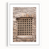 Abstract art print featuring swirling blue and gray tones on a white framed canvas.