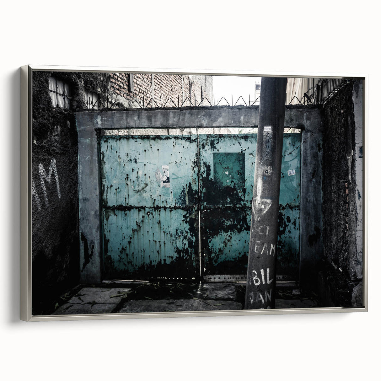 Framed canvas featuring a vintage poster-style landscape art painting with colorful elements on a black background.