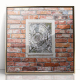 Large art print of a mid-century modernist abstract design in gold and white tones on a framed acrylic.