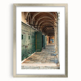 Textured abstract art print in silver frame, featuring swirling gray and white patterns, ideal for modern bedroom decor.