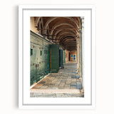 Abstract art print featuring swirling blue and white patterns on a framed canvas, suitable for dining room or bedroom decor.