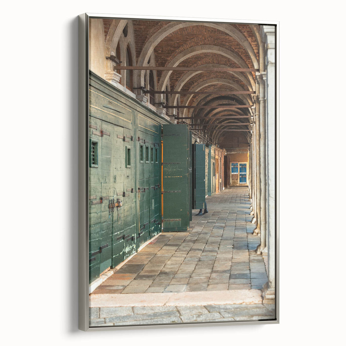 Framed canvas of a vintage landscape painting featuring colorful hills under a silver sky, ideal for living room decor.