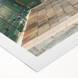 Art deco poster featuring a geometric pattern in muted gold and navy hues on rolled canvas, suitable for dining room decor.