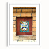 Abstract art print featuring swirling blue and grey tones on a white framed canvas.