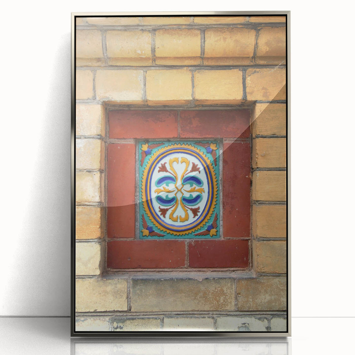 Mid-century modernist art deco poster in a silver frame, featuring geometric shapes in muted tones.