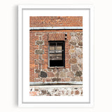 Abstract art print featuring swirling blue and gray tones on a framed white canvas.