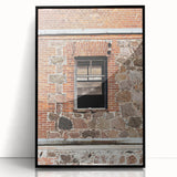 Large abstract wall art print featuring swirling blue and gray tones on a framed acrylic.