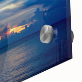 Large abstract wall art on acrylic, featuring swirling blue and gold tones, ideal for dining room ambiance.