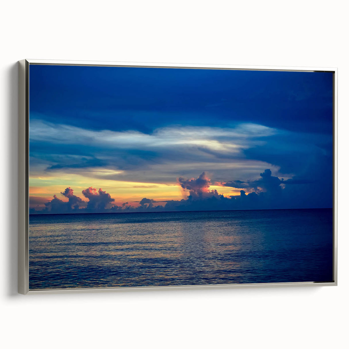 Framed canvas of a landscape painting with vivid colorful art, featuring a vintage poster style on a black background.
