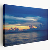 Large abstract canvas art featuring swirling blue and white patterns, ideal for kitchen wall decor.