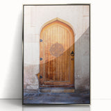 Mid-century modernist art poster featuring geometric shapes in muted teal and orange, framed in silver acrylic.