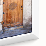 Close-up of extra large framed canvas featuring textured black wall art with vibrant colorful accents.