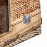 Large abstract wall art in vibrant blue and orange hues on acrylic glass, suited for dining room ambiance.