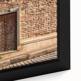 Close-up of textured black wall art with colorful abstract design on a framed canvas, ideal for living room decor.