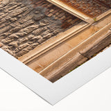 Art deco poster featuring geometric patterns in gold and black on rolled canvas, suitable for dining room decor.