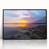 Large abstract wall art in mid-century modernist style featuring vibrant blue and orange swirls on a framed acrylic print.