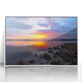 Art deco poster featuring geometric patterns in black and gold on a white acrylic framed canvas.