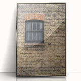 Mid-century modernist art poster featuring geometric shapes in muted earth tones, framed in silver acrylic.