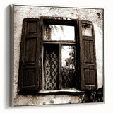 Framed canvas of a vintage landscape painting, featuring a black silhouette against colorful sunset hues.