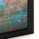 Close-up of black textured art on canvas featuring vibrant colorful accents, ideal for living room decor.