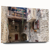 Large abstract wall art on acrylic glass featuring swirls of blue and gray, ideal for modern bedroom or dining room decor.