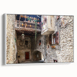 Extra large framed canvas vintage poster art featuring colorful abstract designs on a black background.