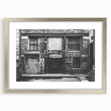 Textured abstract art print in neutral shades on a framed canvas, ideal for modern bedroom ambiance.