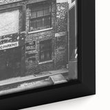 Close-up of black wall art featuring vibrant, colorful textured patterns on a large framed canvas.