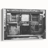 Framed vintage poster art on canvas featuring vibrant, colorful artwork against a black background.