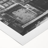 Art deco poster featuring geometric patterns in muted gold and navy, printed on rolled canvas.