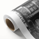 Art deco poster featuring geometric patterns in bold black and gold tones on rolled canvas.