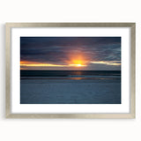 Textured abstract art print in silver frame, featuring swirling gray patterns on white, ideal for bedroom art.