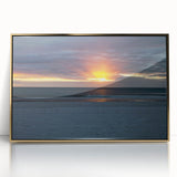 Mid-century modernist art print featuring abstract shapes in muted gold and blue tones, framed acrylic.