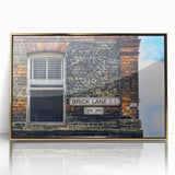 Framed acrylic print of a mid-century modernist abstract design in gold and black tones, suitable for modern art wall decor.