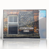 Art deco poster featuring geometric patterns in gold and black on a white acrylic frame, suitable for nursery wall art.