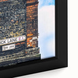 Extra large framed canvas featuring textured, colorful art with black background, ideal for living room decor.