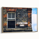 Vintage poster art featuring a black and white landscape painting on a gold-framed canvas, suitable for bedroom decor.