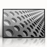 Large abstract wall art in muted grays and blues on a framed acrylic, ideal for modern living room decor.
