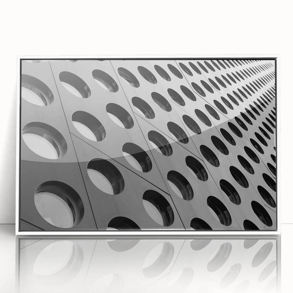 Large art print of a mid-century modernist abstract design in muted earth tones on a framed acrylic.