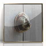 Large art print of a mid-century modernist abstract design in muted gold and white tones on framed acrylic.