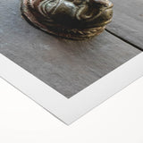 Art Deco poster featuring a geometric pattern in gold and black on rolled canvas, suitable for dining room decor.