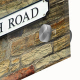 Large abstract wall art in vibrant orange and red tones on acrylic glass, ideal for dining room ambiance.