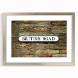 Textured abstract art print featuring swirling grey and white patterns on a silver-framed canvas, suitable for bedroom decor.