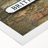 Art deco poster featuring geometric patterns in black and gold on rolled canvas, suitable for dining room decor.