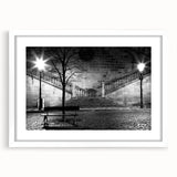 Abstract art print featuring swirling blue and white patterns on a framed canvas, suitable for dining room or bedroom decor.