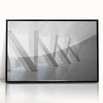Large abstract wall art on acrylic, featuring swirling blue and gray tones, framed, ideal for modern living room decor.