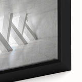 Framed canvas of black textured art with colorful abstract shapes, ideal for living room decor.