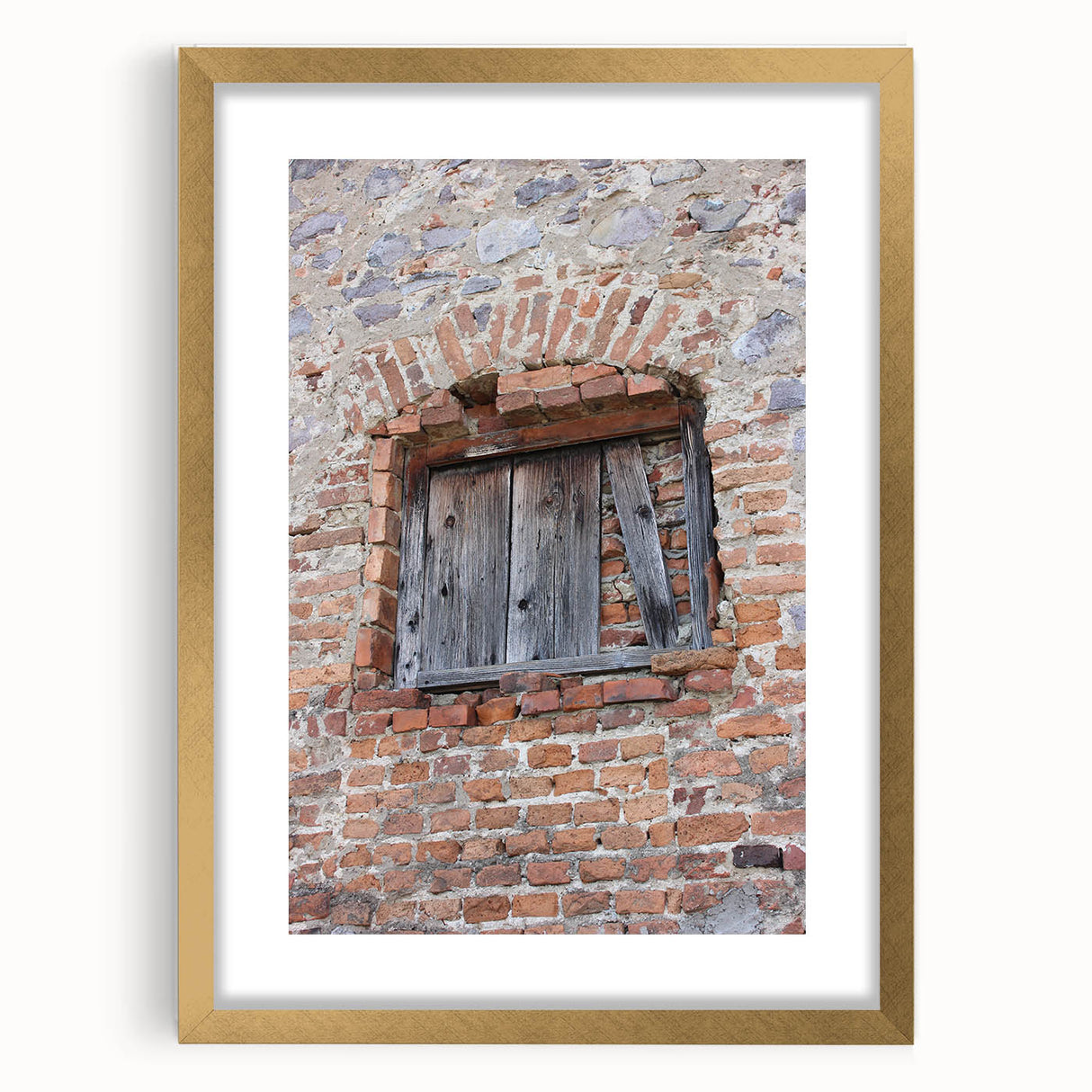 Extra large abstract art print with textured swirls in muted gold and cream tones, framed in gold.